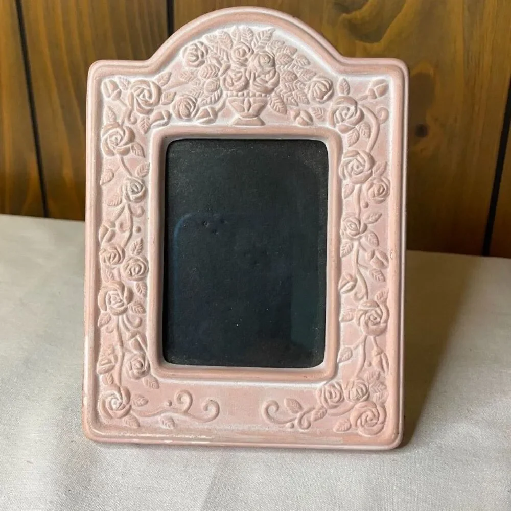 Pink ceramic and terracotta-style picture frame